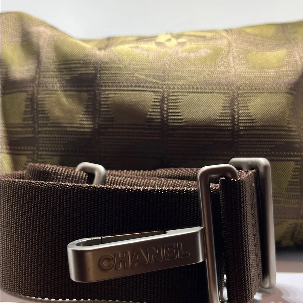 Chanel New Travel Line Mini Roll or Barrel Bag in a khaki or olive green color